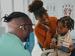 Child being examined at the doctor's office.