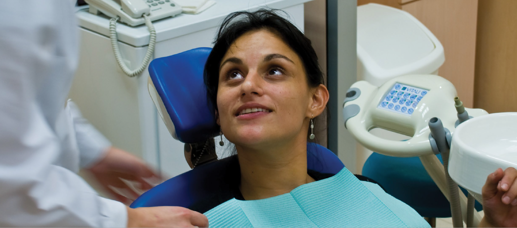 A pregnant mother getting a dental exam.