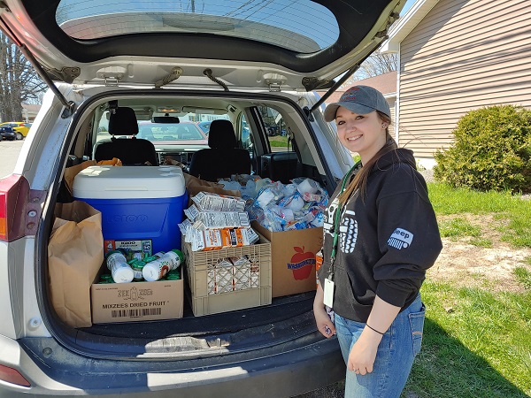 Staff downloading food products