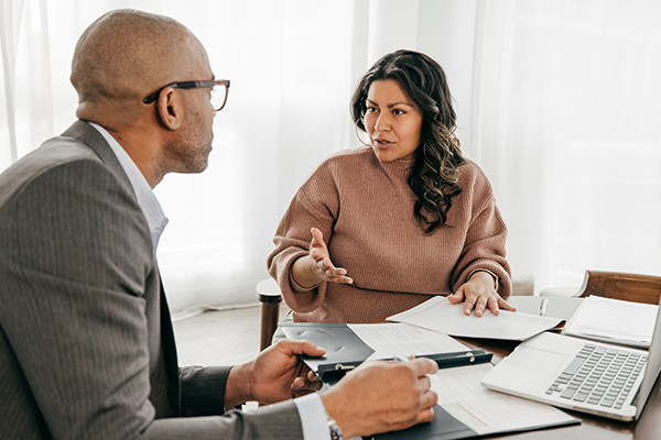 Woman talking with an accountant.