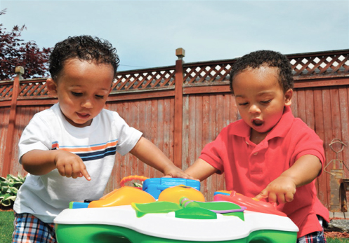 Two boys playing outside