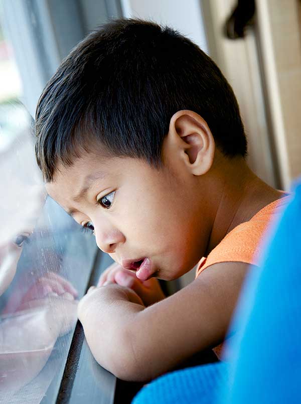 Child at window