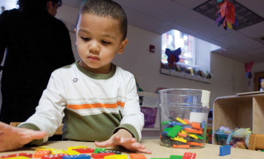 boy playing with blocks