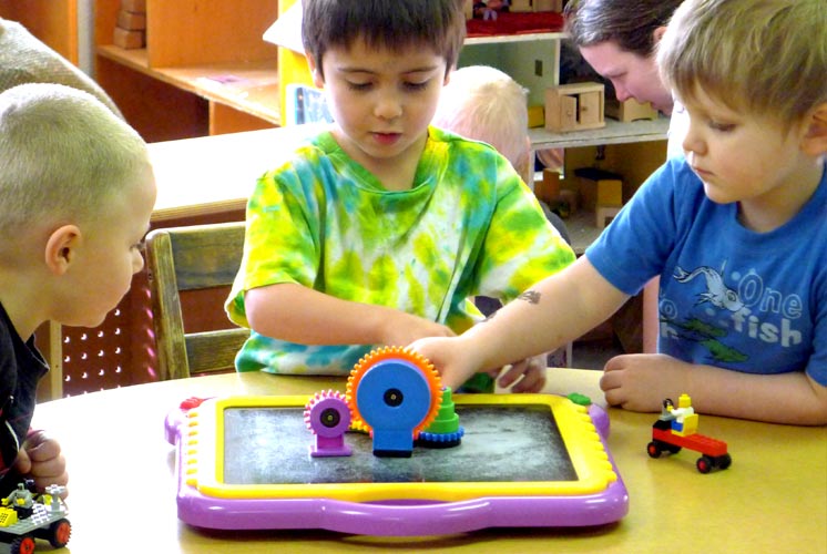 boys playing with puzzle