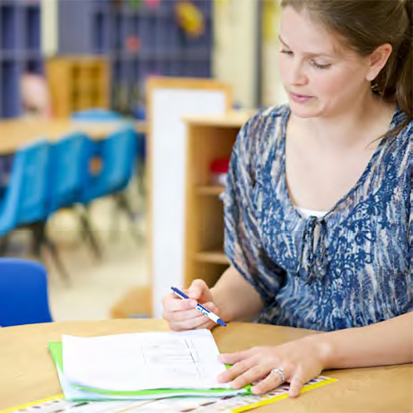 Woman filling out paperwork