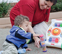 womand and child playing outside