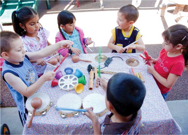 Several children playing at table