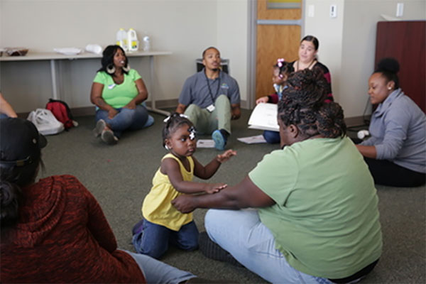 Parents and kids in a group setting