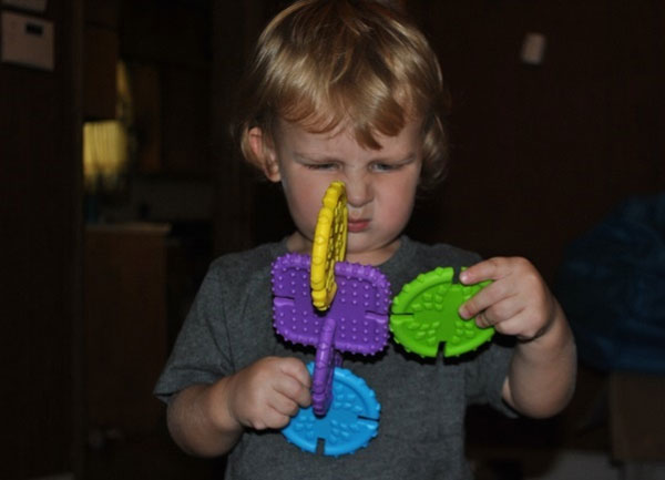 Child working out a puzzle game