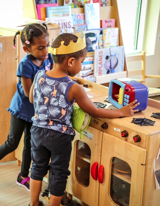 Kids playing together in classroom