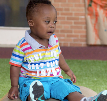 Little baby with colorful t-shirt