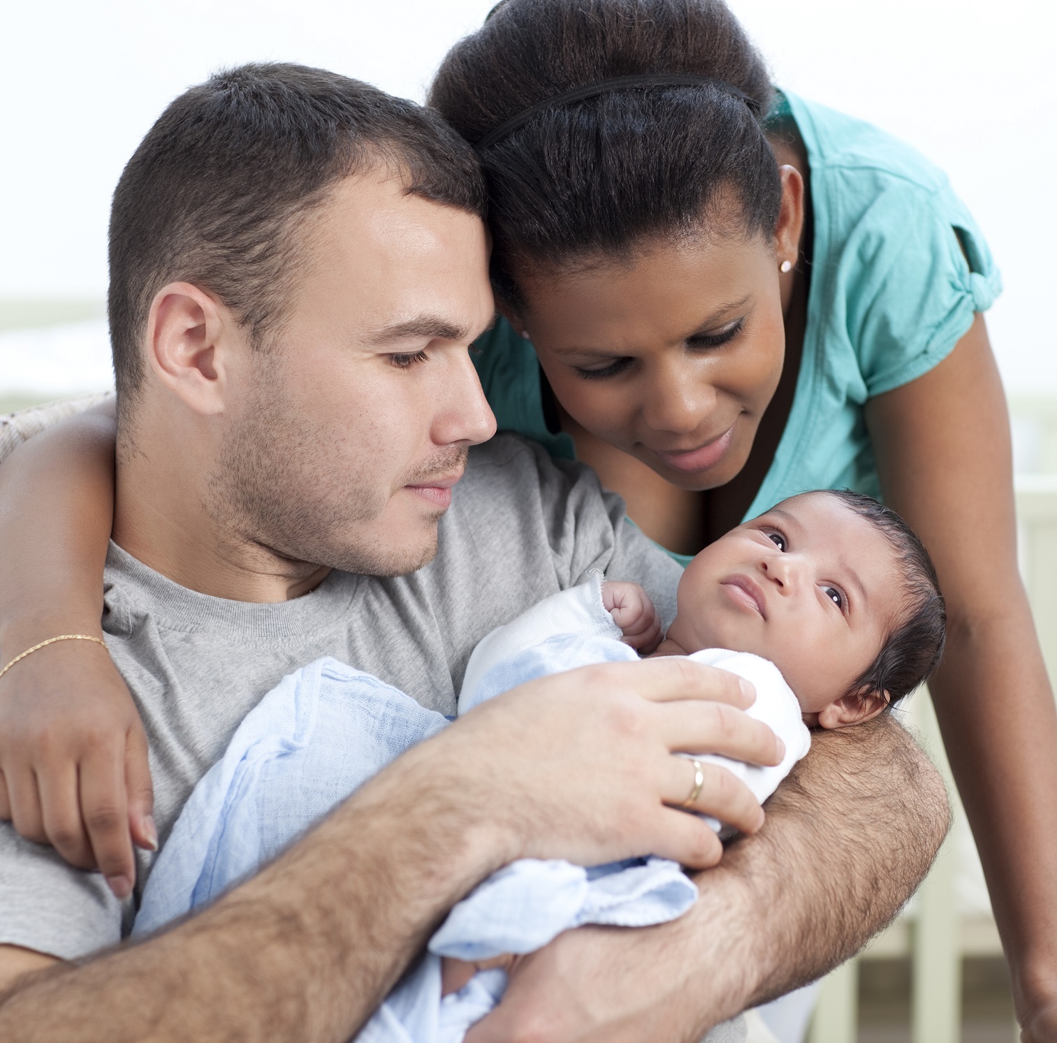 New father holding his baby