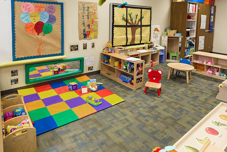 an organized playroom awaits the arrival of children