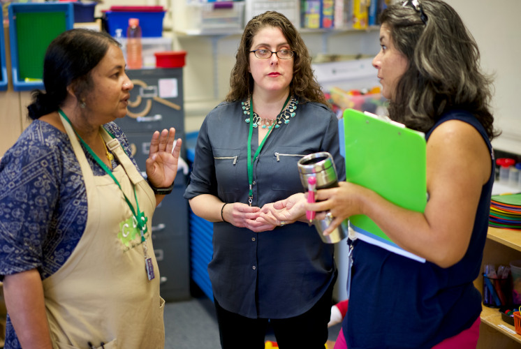 Women talking in classroom